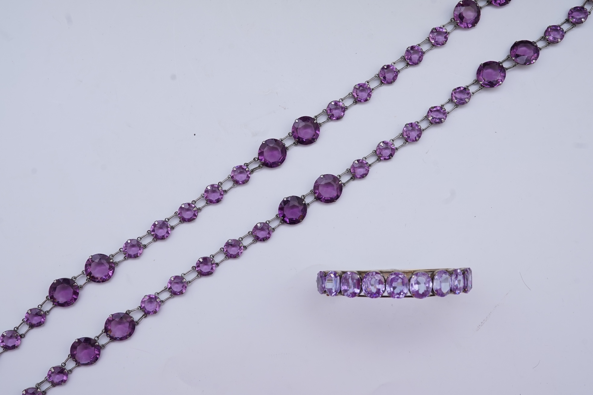A paste necklace, early 20th century, and a cubic zirconia bracelet